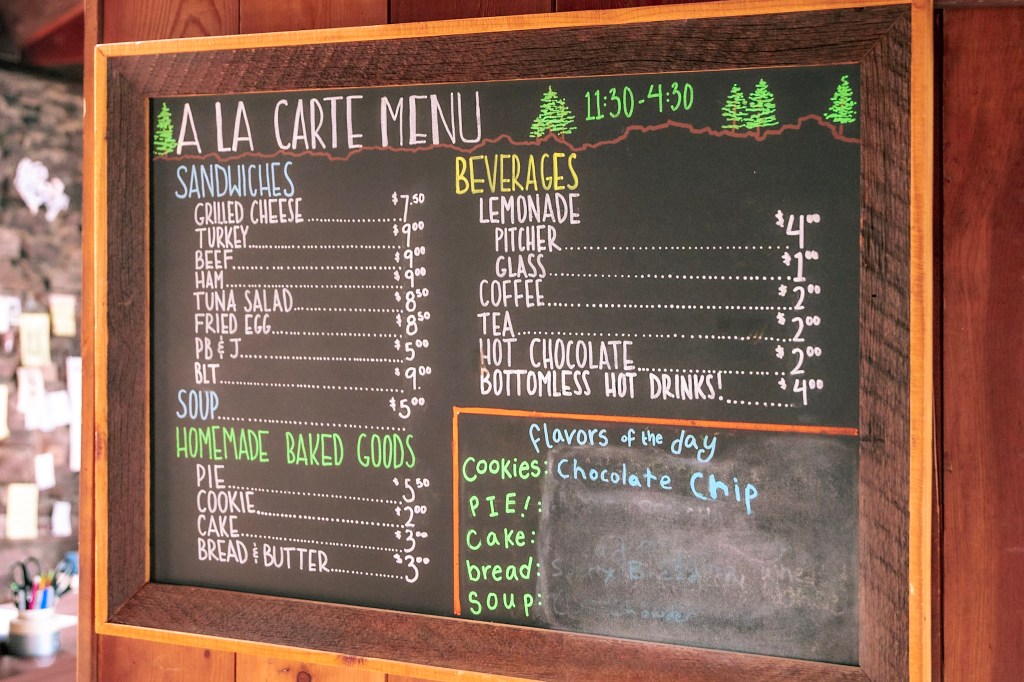 "A LA CARTE MENU" detailing the offerings of the Sperry Chalet dining hall. These include Sandwiches, Soup, Homemade Baked Goods, and Beverages. 