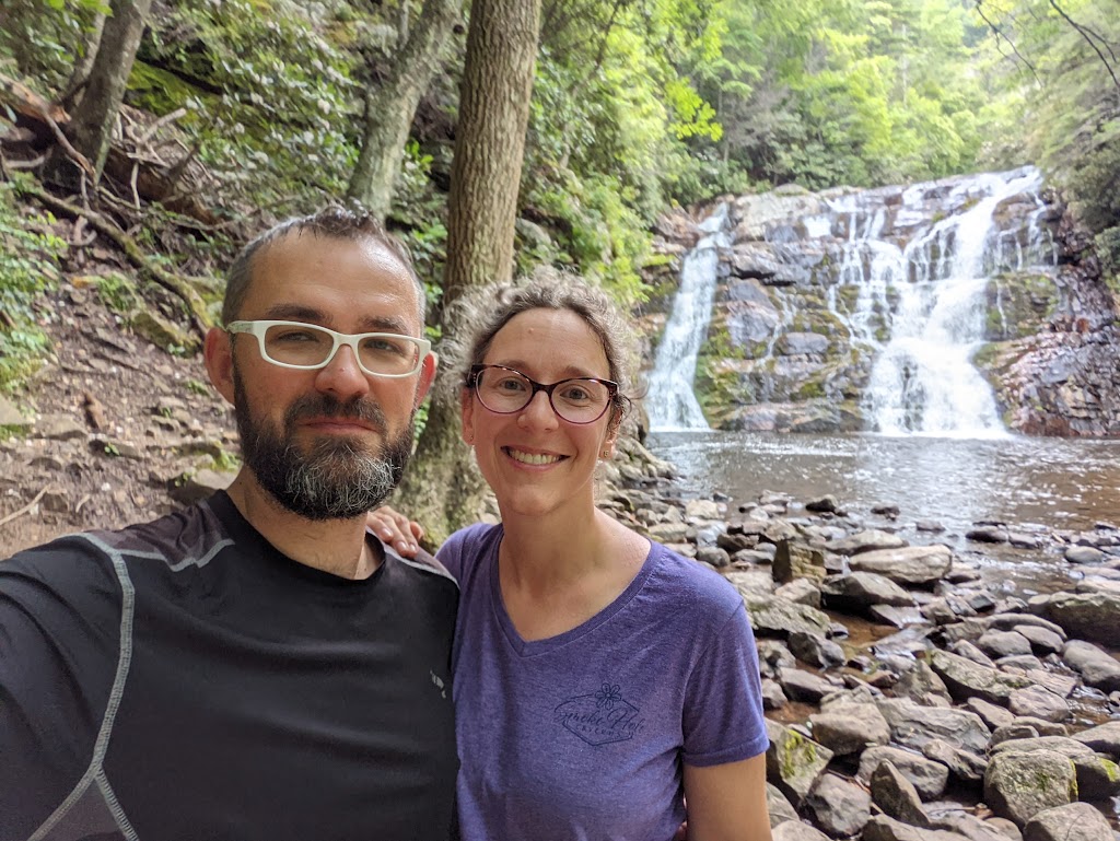 A selfie of Dustin and Laura with Laurel Falls in the background.